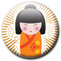 Badge poupée japonaise orange